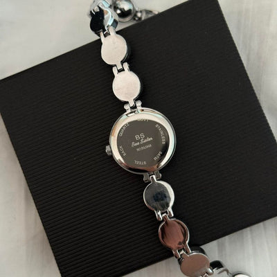 Reloj Serrano