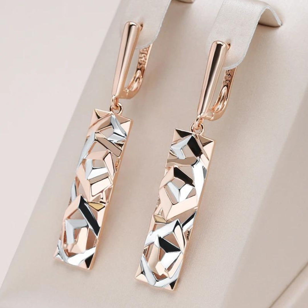 Elegantes pendientes de oro y plata