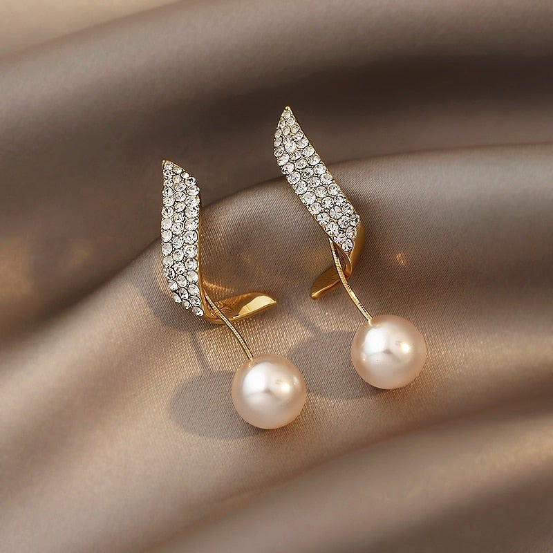 Pendientes de perlas doradas