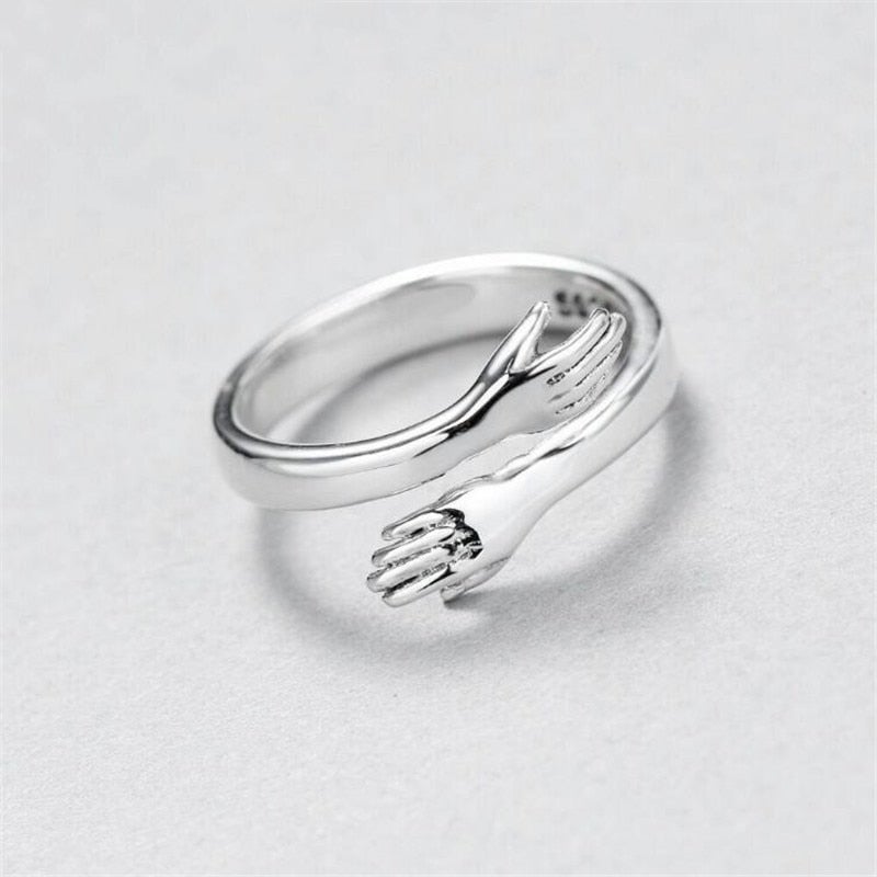 Anillo de abrazo de plata ajustable