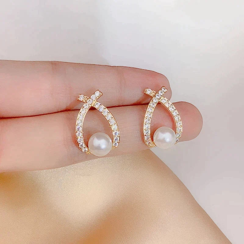 Pendientes de perla y purpurina