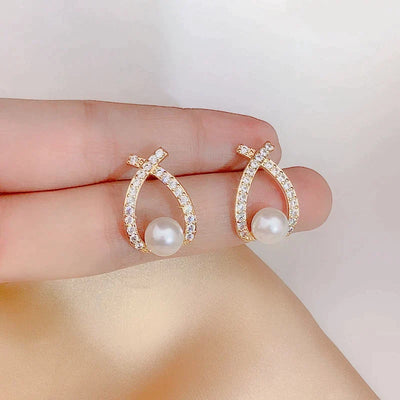 Pendientes de perla y purpurina