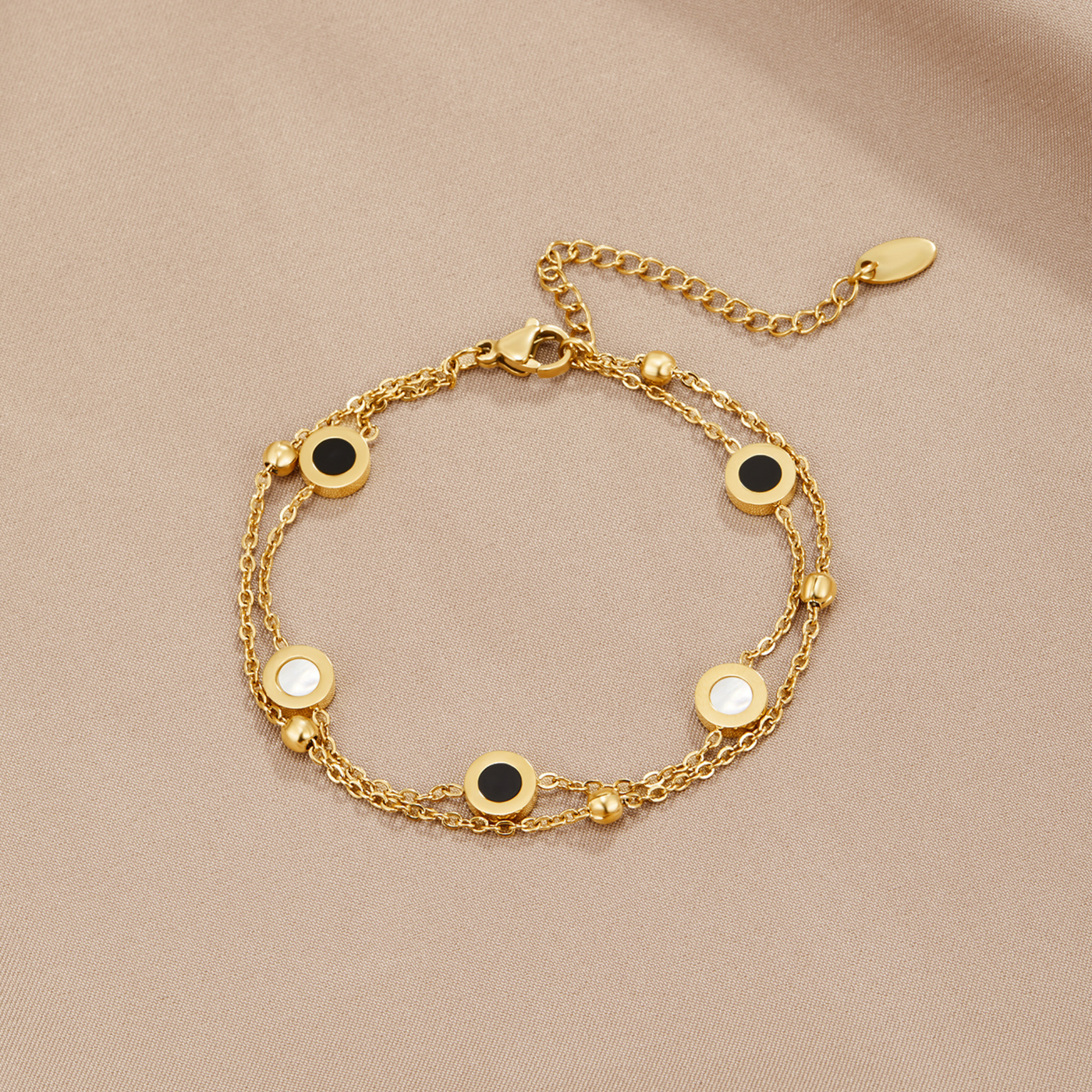 Pulsera de ónix y piedra blanca
