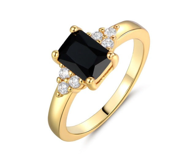 Anillo baguette con espinela negra