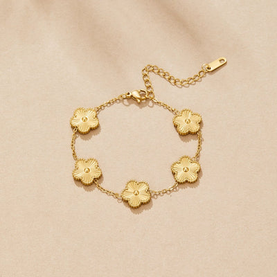 Pulsera de trébol dorado