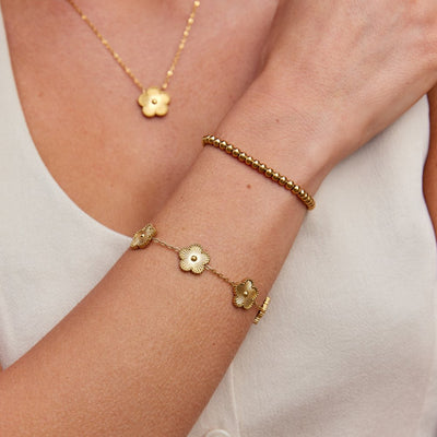 Pulsera de trébol dorado