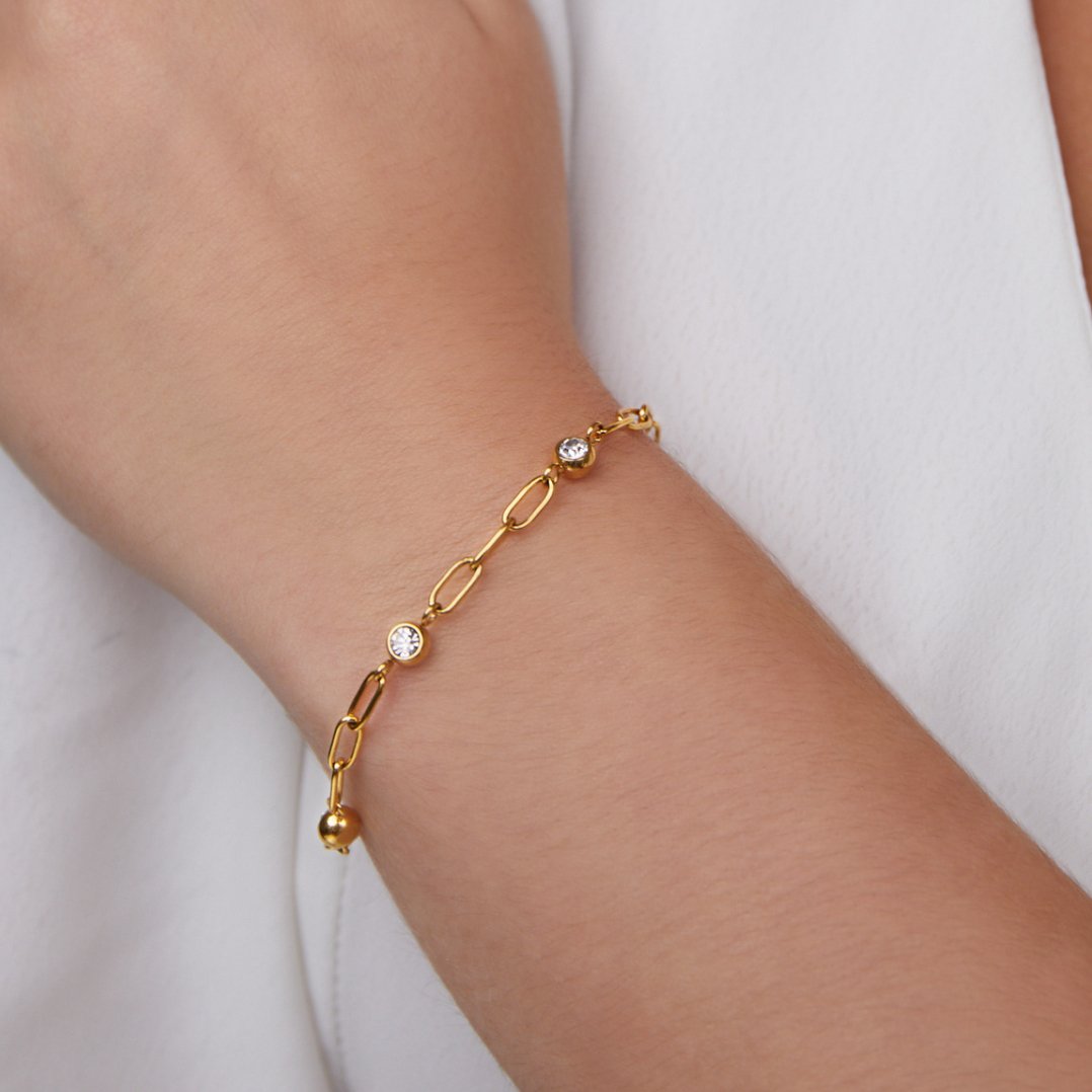 Pulsera Mónica con cristales y cadena dorada