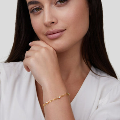 Pulsera Mónica con cristales y cadena dorada