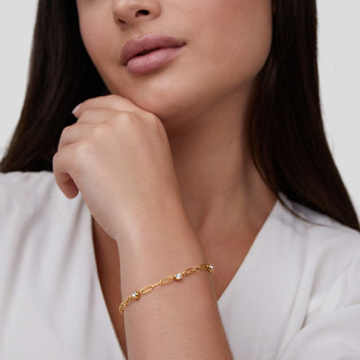 Pulsera Mónica con cristales y cadena dorada