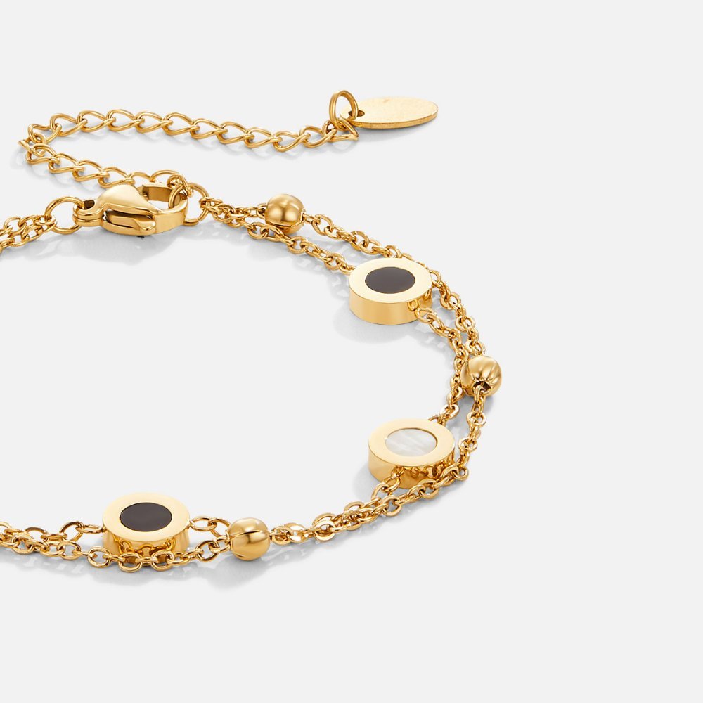 Pulsera de ónix y piedra blanca