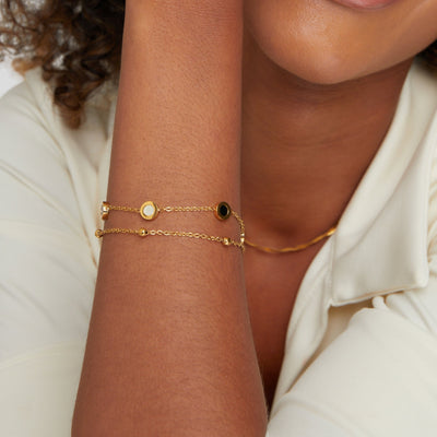 Pulsera de ónix y piedra blanca